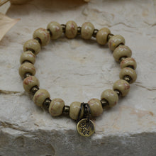 Load image into Gallery viewer, Oat | Bel Koz Round Clay Bead Bracelet
