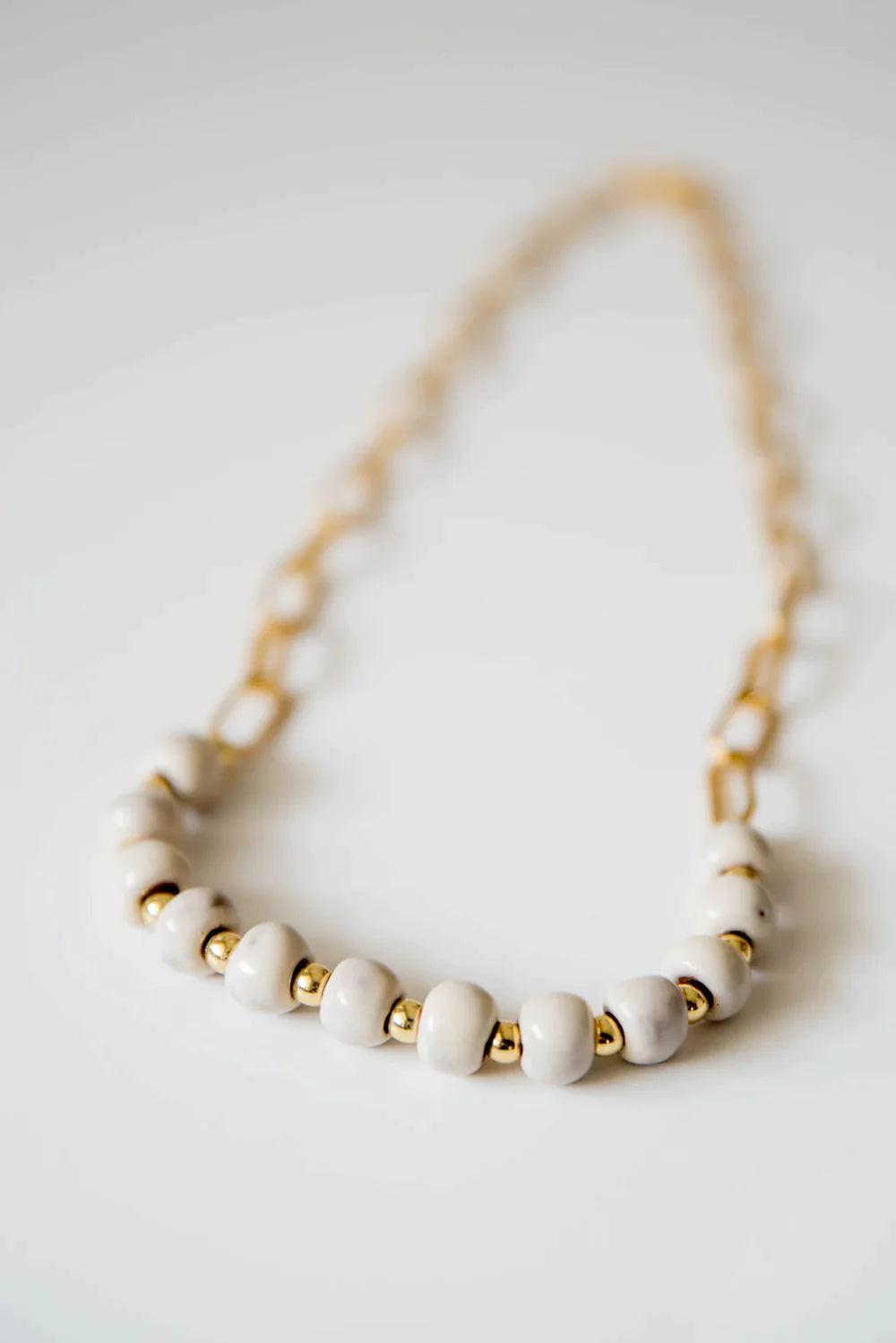 Bel Koz Gold Single Strand Clay Necklace - PEARL - Link in description to purchase at Betsey's